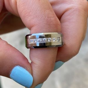 Silver tungsten ring with single row of CZ’s.